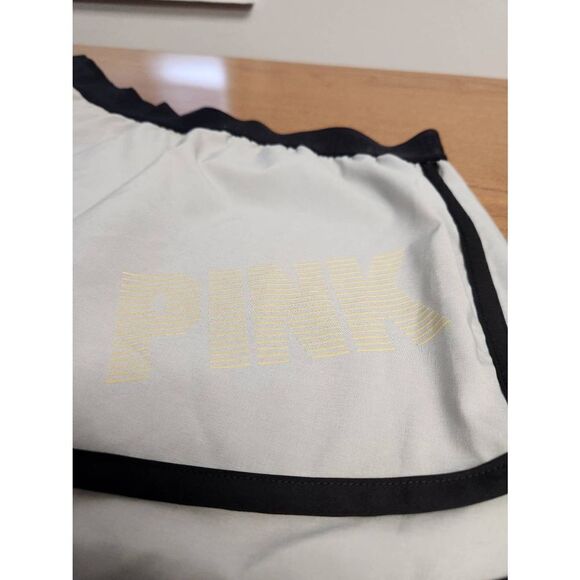 Pink LARGE grey shorts with black trim and PINK made out of Zebra font in yellow - Picture 2 of 7